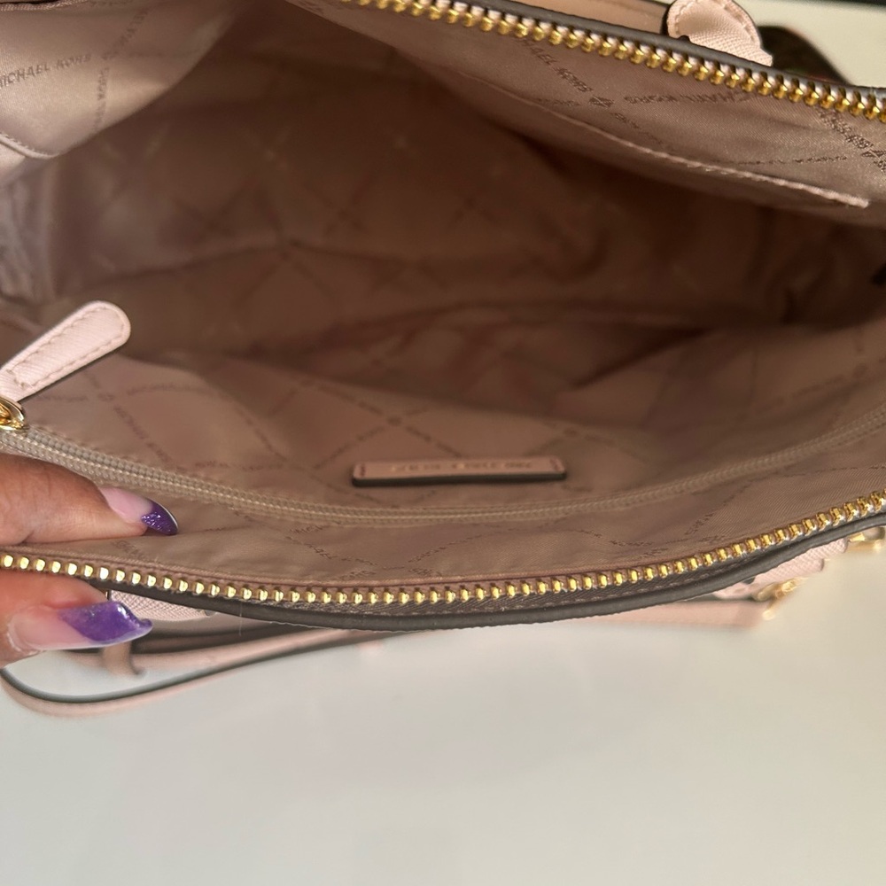 Never used beautiful Michael Kors bag. Brown with pink roses.